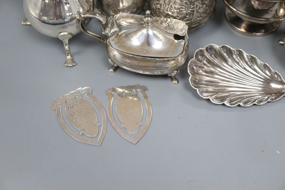 Small silver including condiments, milk jug, serving spoon, Indian jug and bookmarks.